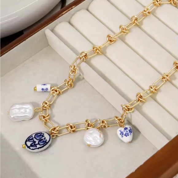 Anthropologe Gold and Blue Charm Necklace - Picture 3 of 8